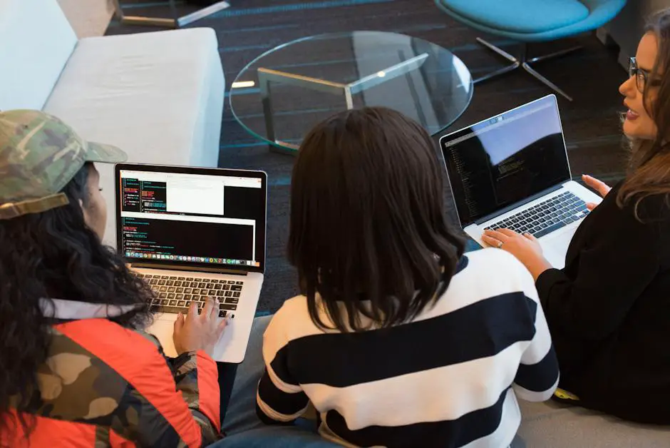 A person working on a laptop with a cogwheel symbolizing task automation